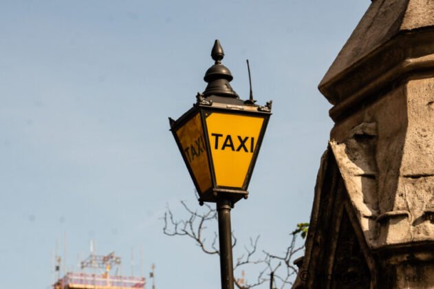 Vintage style Taxi stand lamp outside the Houses of Parliament Westminster