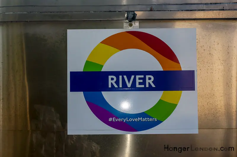 TFL riverboat sign Pride style