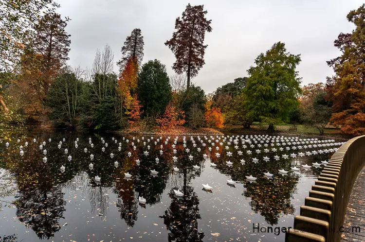 Discover the Magic of Kew Gardens in Autumn: Your Guide to the Golden Season 4 Kew Gardens Christmas Decorations floating in the lake by the Sackler Crossing
