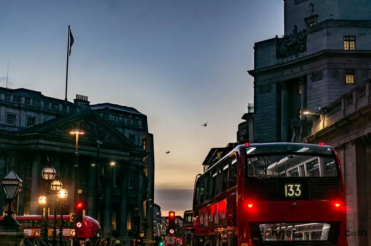 The Monetisation of the London Red Bus: The Best London Bus Ads 31 Royal Exchange Winter evening 2 chinook helicopters fly past