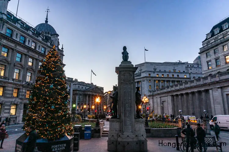 Royal Exchange Christmas time commuters stroll past