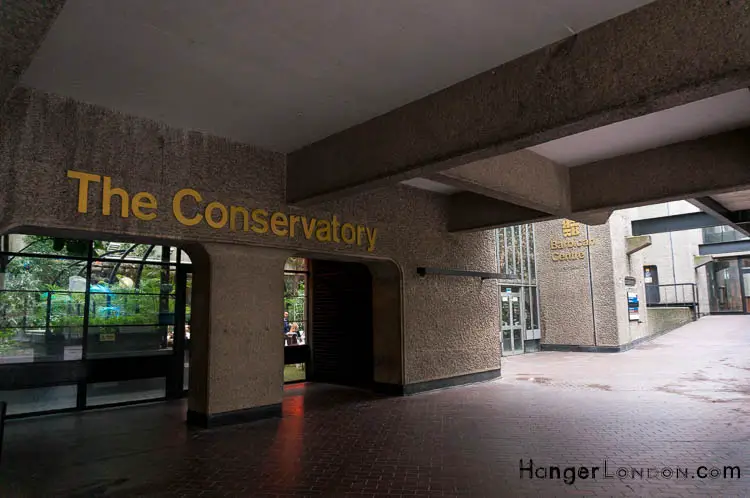 The Battle of the Botanical Giants: The Barbican Conservatory vs Kew Gardens 1 Outside sign entrance