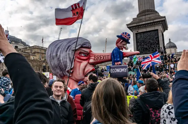 brexit rally march PM May puppet