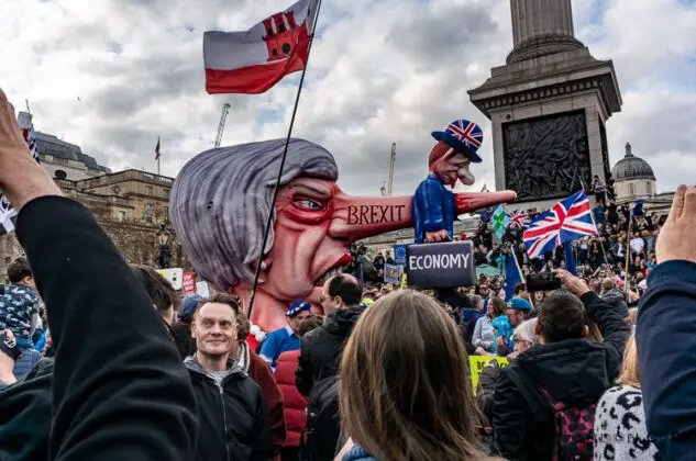 Brexit Culture: Flags and Signs Speak Out 1 brexit rally march PM May puppet