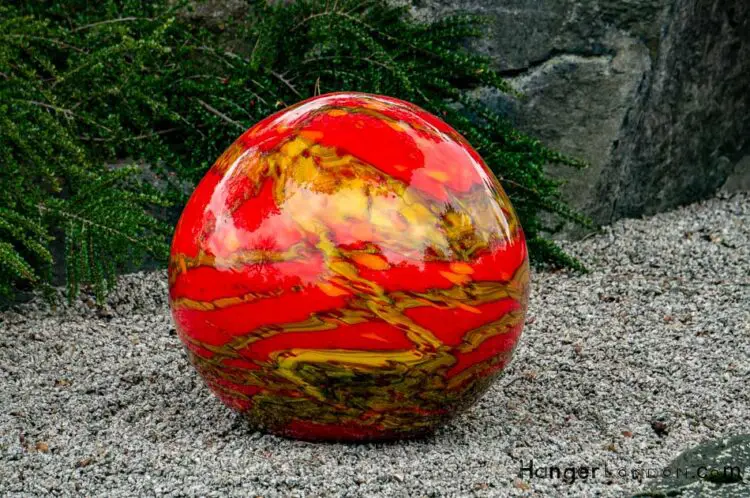 red and tan marble effect glass sphere niijima floats chihuly