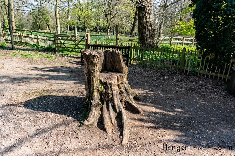 Tree trunk seat Holland park
