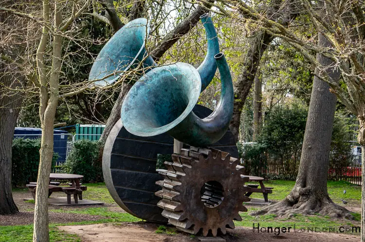 The Untold Story of Holland Park: A History Beyond the Crown 22 Sculpture by Andrew Burton 2000 Annunciation large horns on cogs