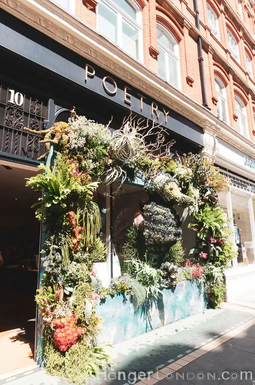 The definitive list of all 88 entries at RHS Chelsea in Bloom 2019 Flower Show 82 Side view of store POETRY in Bloom