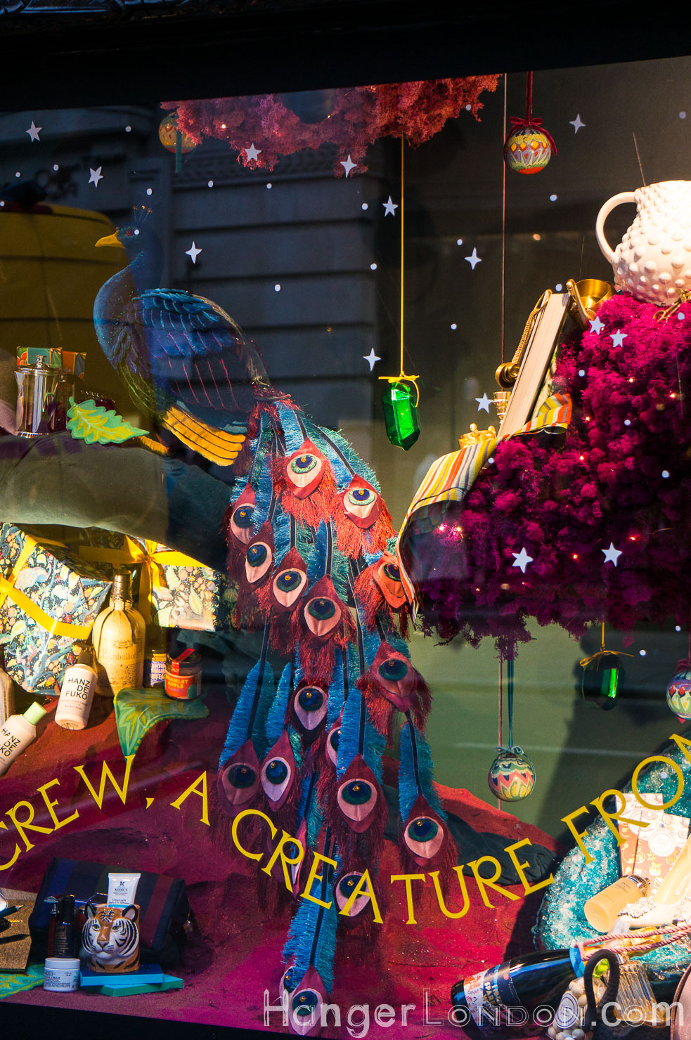 A Festive Farewell: London's Last Christmas Before Covid-19 30 Liberty winter window peacock